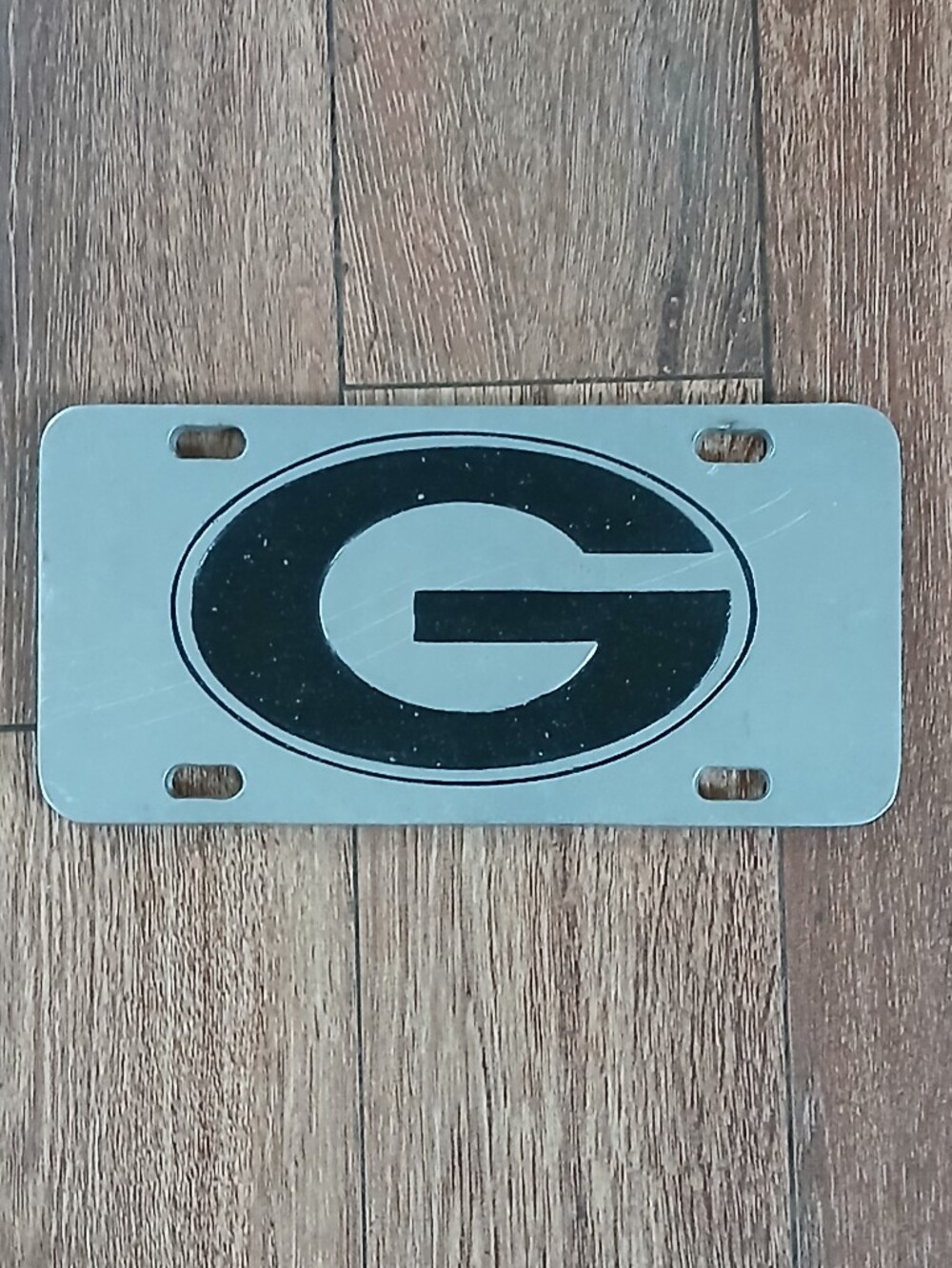 Black 'G' Logo Metal License Plate - Team Style Accent